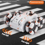 JJRC JC05 2.4Ghz Double Sided Stunt Car Five-Wheel Swing Arm Drift Car Watch Gesture / Remote Controller Car Toy with Colorful Light, Music - Grey / Orange